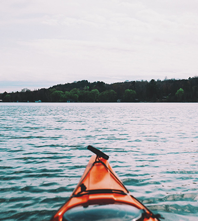 Prow of a canoe on the river